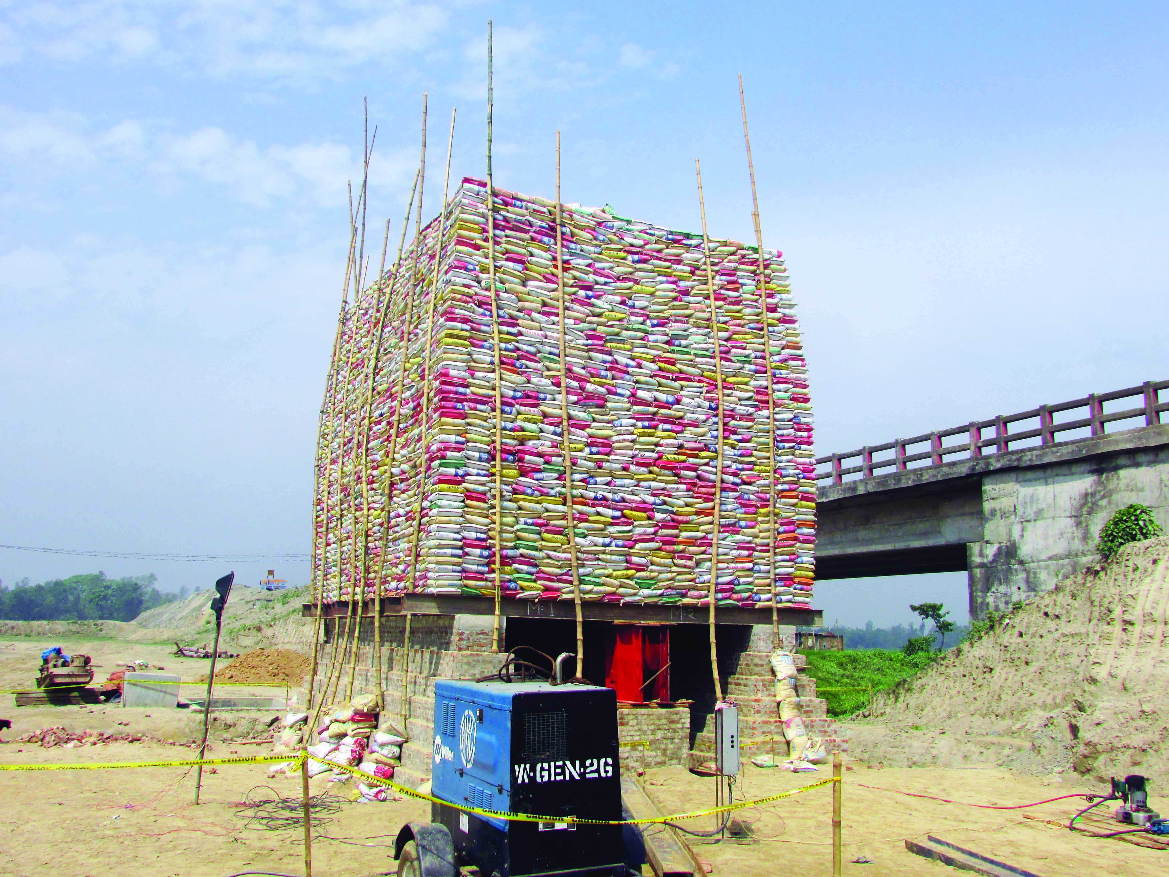 Pile load test by kentledge method for rail bridge on Titas river at Akhaura.